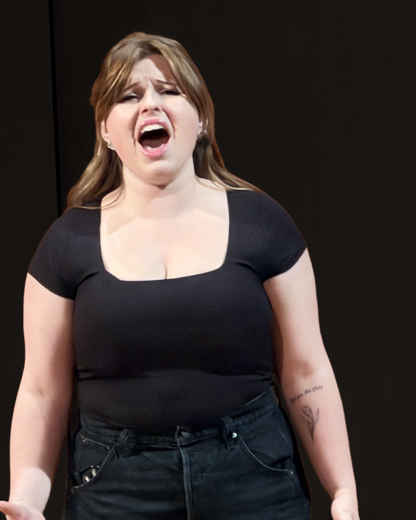Haley Tarrant singing on stage at ENMU